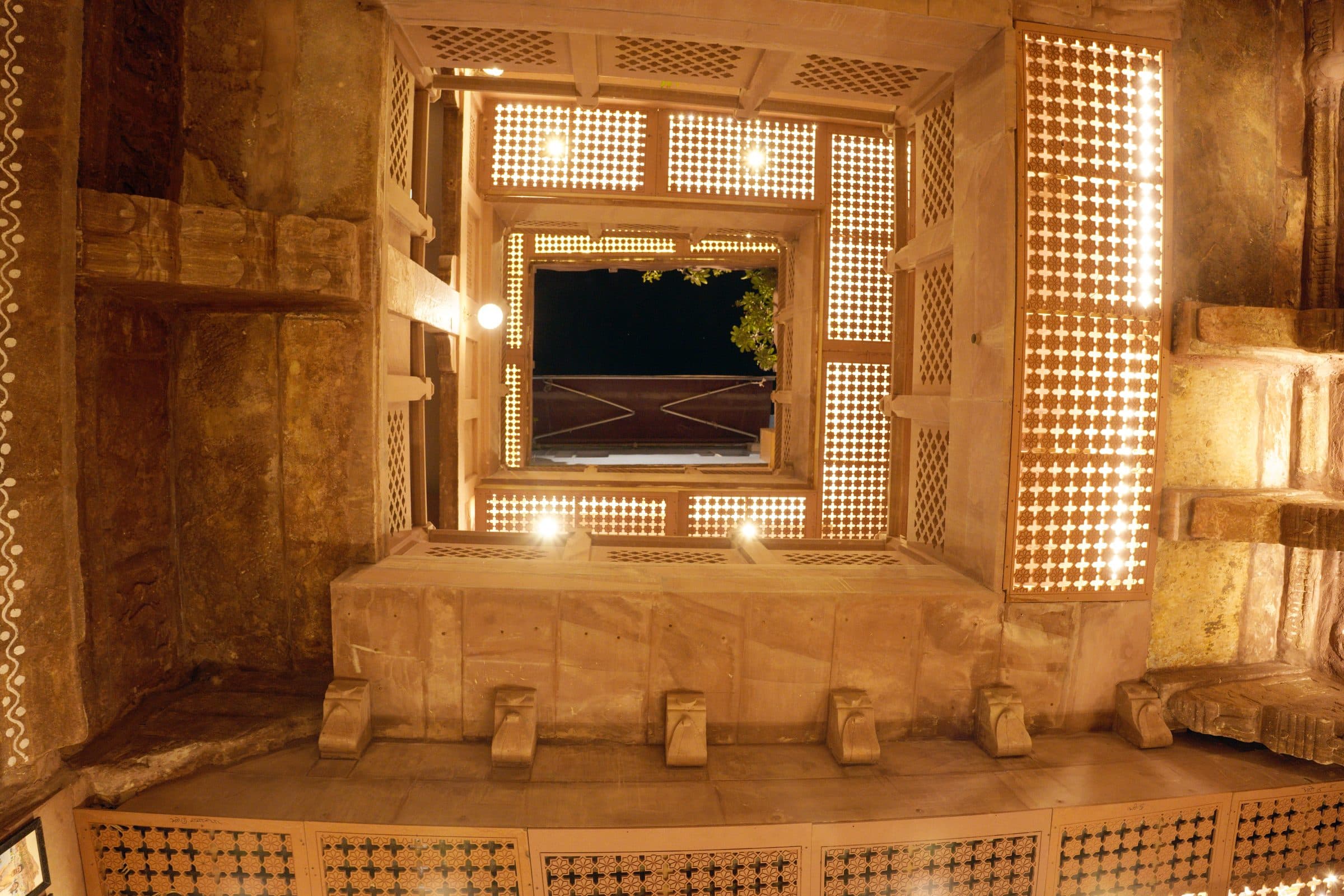 Intricately carved jharokha window