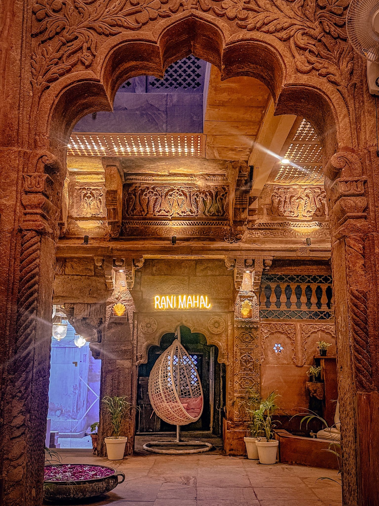 Carved sandstone archway leading into the Rani Mahal lobby
